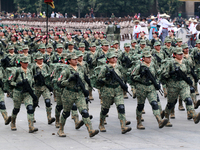 Women belonging to the Mexican Army participate in the parade on the occasion of the 114th anniversary of the Mexican Revolution at the capi...