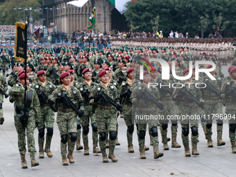 Women belonging to the Mexican Army participate in the parade on the occasion of the 114th anniversary of the Mexican Revolution at the capi...