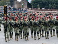 Women belonging to the Mexican Army participate in the parade on the occasion of the 114th anniversary of the Mexican Revolution at the capi...