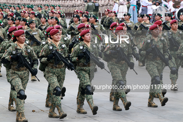 Women belonging to the Mexican Army participate in the parade on the occasion of the 114th anniversary of the Mexican Revolution at the capi...