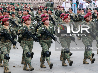 Women belonging to the Mexican Army participate in the parade on the occasion of the 114th anniversary of the Mexican Revolution at the capi...