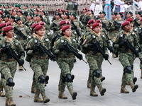 Women belonging to the Mexican Army participate in the parade on the occasion of the 114th anniversary of the Mexican Revolution at the capi...