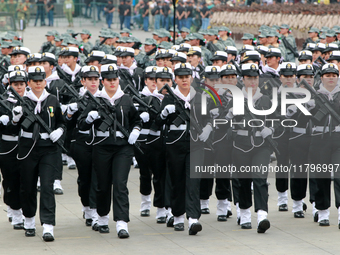 Women belonging to the Mexican Navy participate in the parade on the occasion of the 114th anniversary of the Mexican Revolution at the Zoca...