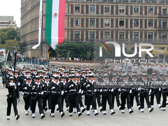 Women belonging to the Mexican Navy participate in the parade on the occasion of the 114th anniversary of the Mexican Revolution at the Zoca...