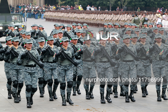 Women belonging to the National Guard participate in the parade on the occasion of the 114th anniversary of the Mexican Revolution at the Zo...