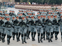 Women belonging to the National Guard participate in the parade on the occasion of the 114th anniversary of the Mexican Revolution at the Zo...