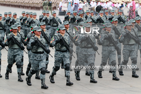 Women belonging to the National Guard participate in the parade on the occasion of the 114th anniversary of the Mexican Revolution at the Zo...