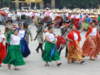 Members of the Mexican armed forces dress as they were during the Mexican Revolution and take part in a parade marking the 114th anniversary...