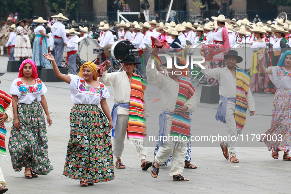 Members of the Mexican armed forces dress as they were during the Mexican Revolution and take part in a parade marking the 114th anniversary...