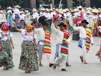 Members of the Mexican armed forces dress as they were during the Mexican Revolution and take part in a parade marking the 114th anniversary...