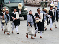 Members of the Mexican armed forces dress as they were during the Mexican Revolution and take part in a parade marking the 114th anniversary...