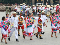 Members of the Mexican armed forces dress as they were during the Mexican Revolution and take part in a parade marking the 114th anniversary...