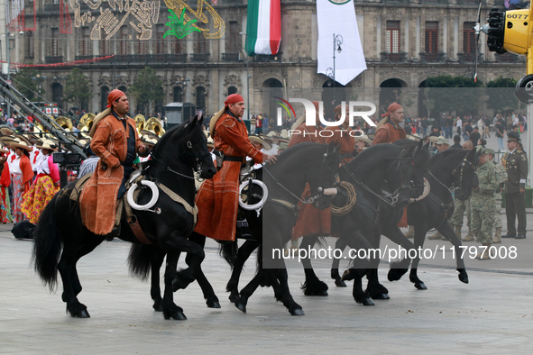 Members of the Mexican armed forces, mounted on horses, take part in the parade marking the 114th anniversary of the Mexican Revolution at t...