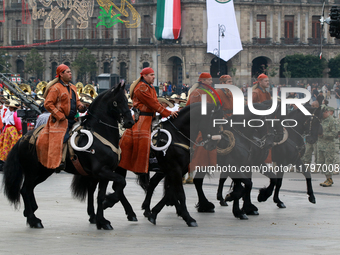 Members of the Mexican armed forces, mounted on horses, take part in the parade marking the 114th anniversary of the Mexican Revolution at t...