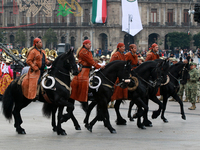 Members of the Mexican armed forces, mounted on horses, take part in the parade marking the 114th anniversary of the Mexican Revolution at t...