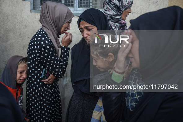 Mourners react during the funeral of Palestinians killed in an Israeli strike at Al-Aqsa Martyrs Hospital in Deir Al-Balah, in the central G...