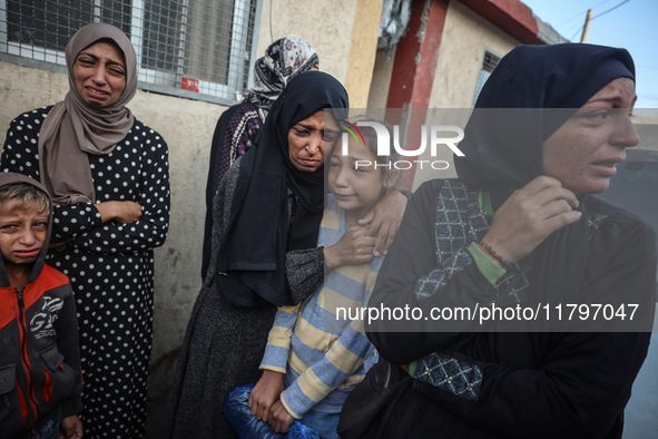 Mourners react during the funeral of Palestinians killed in an Israeli strike at Al-Aqsa Martyrs Hospital in Deir Al-Balah, in the central G...