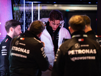 George Russell speaks to his team in the Mercedes garage paddock entrance ahead of the Formula 1 Heineken Silver Las Vegas Grand Prix in Las...