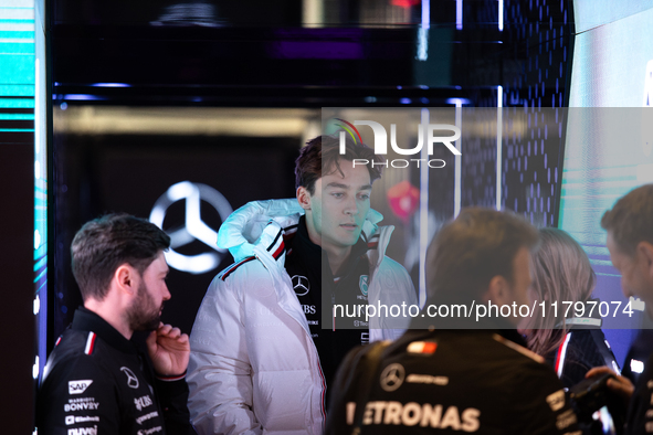 George Russell speaks to his team in the Mercedes garage paddock entrance ahead of the Formula 1 Heineken Silver Las Vegas Grand Prix in Las...