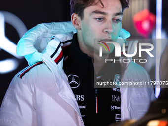 George Russell speaks to his team in the Mercedes garage paddock entrance ahead of the Formula 1 Heineken Silver Las Vegas Grand Prix in Las...