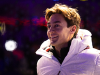 George Russell speaks to his team in the Mercedes garage paddock entrance ahead of the Formula 1 Heineken Silver Las Vegas Grand Prix in Las...