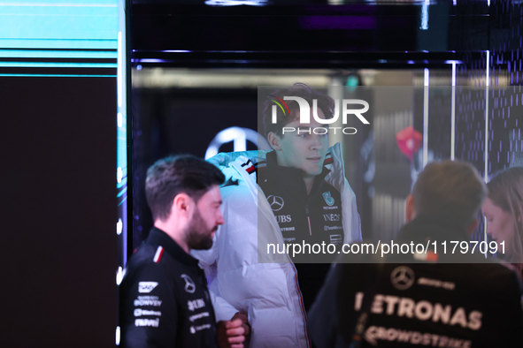 George Russell speaks to his team in the Mercedes garage paddock entrance ahead of the Formula 1 Heineken Silver Las Vegas Grand Prix in Las...