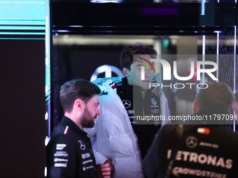 George Russell speaks to his team in the Mercedes garage paddock entrance ahead of the Formula 1 Heineken Silver Las Vegas Grand Prix in Las...