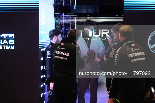 George Russell speaks to his team in the Mercedes garage paddock entrance ahead of the Formula 1 Heineken Silver Las Vegas Grand Prix in Las...