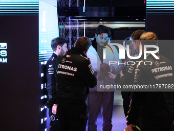 George Russell speaks to his team in the Mercedes garage paddock entrance ahead of the Formula 1 Heineken Silver Las Vegas Grand Prix in Las...