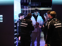 George Russell speaks to his team in the Mercedes garage paddock entrance ahead of the Formula 1 Heineken Silver Las Vegas Grand Prix in Las...