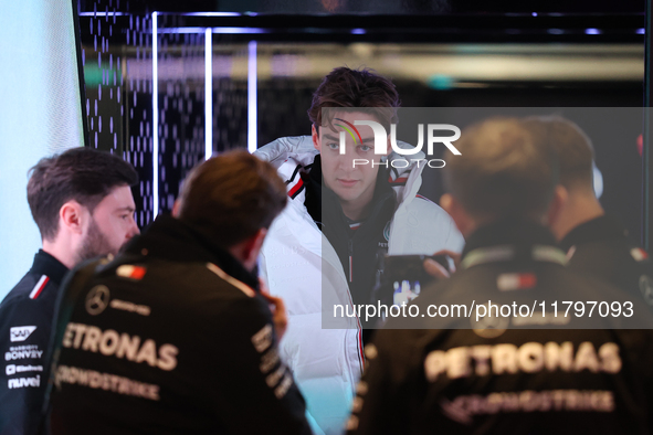 George Russell speaks to his team in the Mercedes garage paddock entrance ahead of the Formula 1 Heineken Silver Las Vegas Grand Prix in Las...