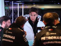 George Russell speaks to his team in the Mercedes garage paddock entrance ahead of the Formula 1 Heineken Silver Las Vegas Grand Prix in Las...