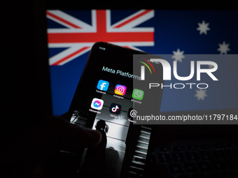 Social network logos display on a smartphone screen and the Australian flag appears on a computer screen in this photo illustration in Athen...