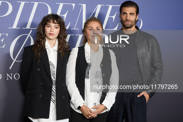 At a photocall for ''Pideme lo que Quieras'' in Madrid, Spain, on November 21, 2024, Gabriela Andrada, Megan Maxwell, and Mario Ermito appea...