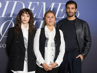 At a photocall for ''Pideme lo que Quieras'' in Madrid, Spain, on November 21, 2024, Gabriela Andrada, Megan Maxwell, and Mario Ermito appea...