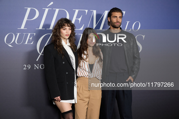 At a photocall for ''Pideme lo que Quieras'' in Madrid, Spain, on November 21, 2024, Gabriela Andrada, Lucia Alemany, and Mario Ermito are p...