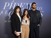 At a photocall for ''Pideme lo que Quieras'' in Madrid, Spain, on November 21, 2024, Gabriela Andrada, Lucia Alemany, and Mario Ermito are p...