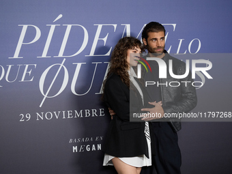 At a photocall for ''Pideme lo que Quieras'' in Madrid, Spain, on November 21, 2024, Gabriela Andrada and Mario Ermito pose. (