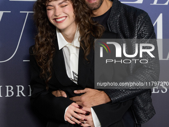 At a photocall for ''Pideme lo que Quieras'' in Madrid, Spain, on November 21, 2024, Gabriela Andrada and Mario Ermito pose. (