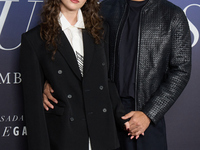 At a photocall for ''Pideme lo que Quieras'' in Madrid, Spain, on November 21, 2024, Gabriela Andrada and Mario Ermito pose. (