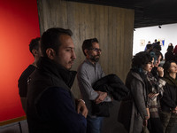 Iranian visitors explore the ''Eye to Eye, Portraiture in Modern and Contemporary Art'' exhibition at the Museum of Contemporary Arts in cen...