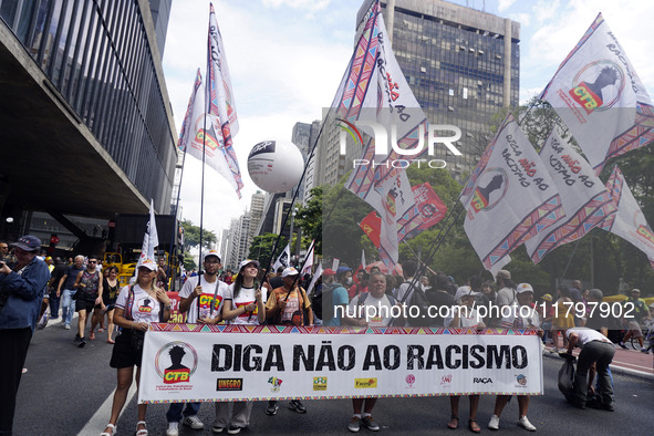 People attend a rally against racism during Black Awareness Day in Sao Paulo, Brazil, on November 20, 2024. 