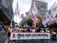 People attend a rally against racism during Black Awareness Day in Sao Paulo, Brazil, on November 20, 2024. (