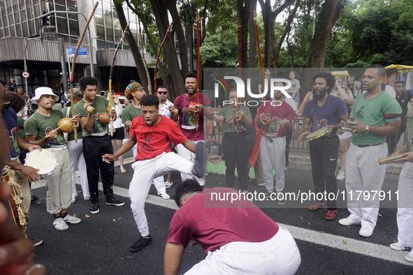 People attend a rally against racism during Black Awareness Day in Sao Paulo, Brazil, on November 20, 2024. 