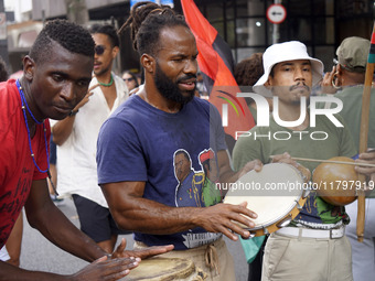 People attend a rally against racism during Black Awareness Day in Sao Paulo, Brazil, on November 20, 2024. (