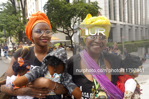 People attend a rally against racism during Black Awareness Day in Sao Paulo, Brazil, on November 20, 2024. 