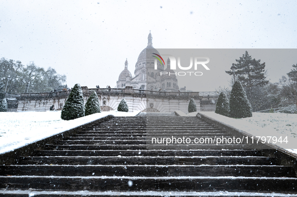 A view of the Basilique du Sacre-Coeur in heavy snowfall as Paris is under the second highest weather warning by the French national weather...