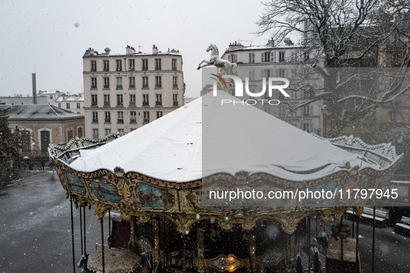 The view from Montmartre shows heavy snowfall as Paris is under the second highest weather warning by the French national weather service fo...