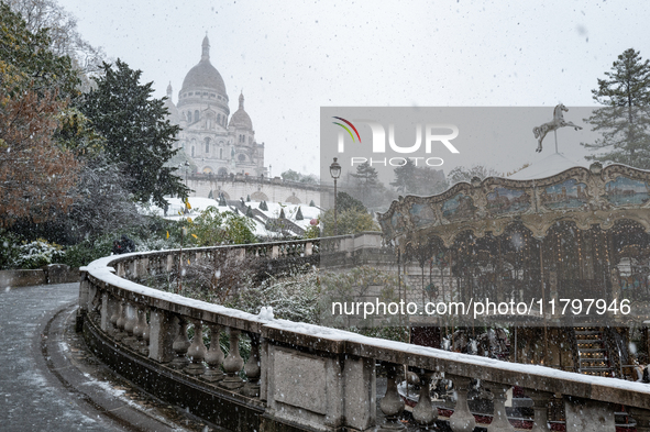 A view of the Basilique du Sacre-Coeur in heavy snowfall as Paris is under the second highest weather warning by the French national weather...