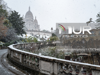 A view of the Basilique du Sacre-Coeur in heavy snowfall as Paris is under the second highest weather warning by the French national weather...